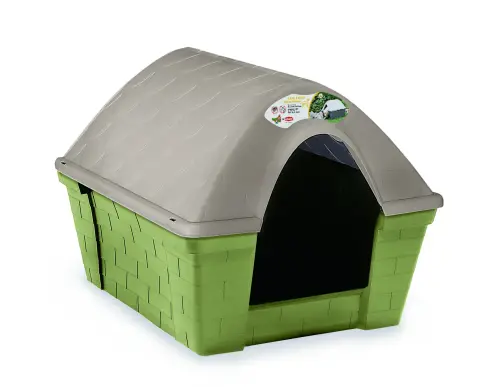 Niche pour chien grande installée dans un jardin montrant sa résistance aux intempéries