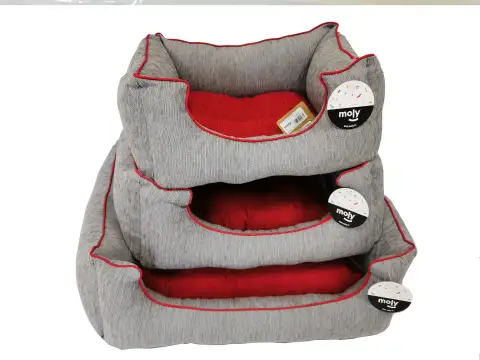 Détail du rembourrage intérieur et texture douce de la corbeille chenille gris pour chiens