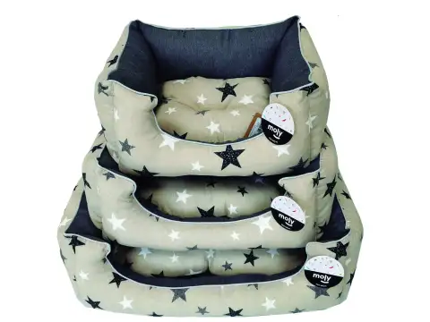 Détail du rembourrage anti-acariens et finition lavable du coussin Estrellitas T-1