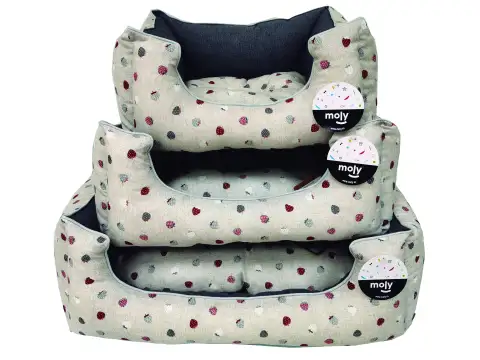 Détail du rembourrage anti-acariens et design lavable du coussin Compa Pattes